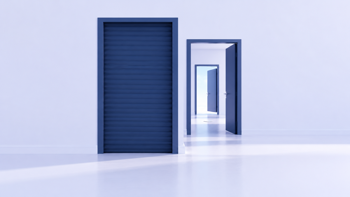 Three doorways in a pale corridor: the nearest is sealed by a solid navy steel shutter, while two further doorways stand open behind it and a small identity card lies on the floor beyond the shutter, out of reach